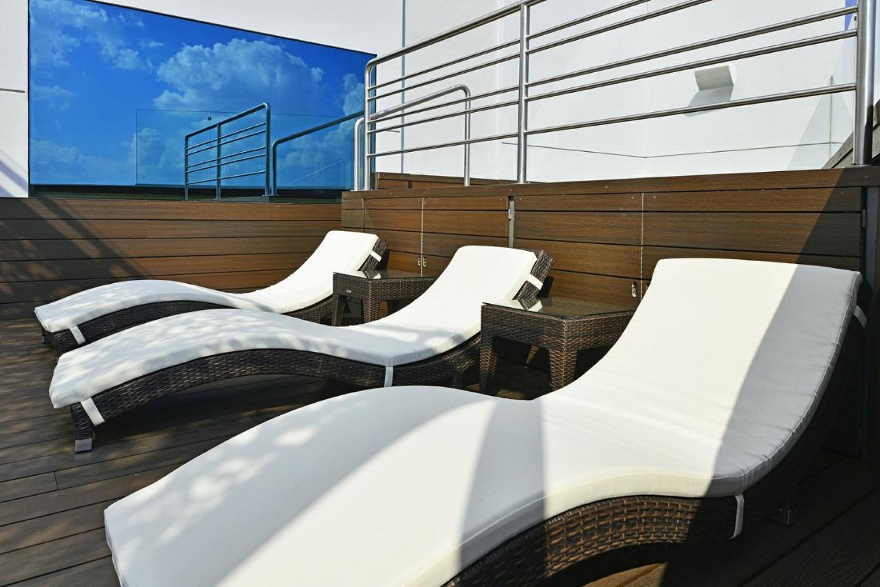 Baruk Guadalajara Hotel De Autor Екстер'єр фото Sunbathing chairs on the deck of a cruise ship
